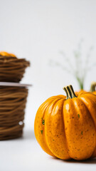 Sticker - Close-up of a Small Orange Pumpkin on a White Background