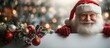 © manoharan - Photo of Santa Claus peeking for giving gifts