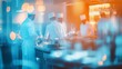 © Morng - Blurred image of chefs working in a professional kitchen with an atmosphere of activity and vibrant lighting.