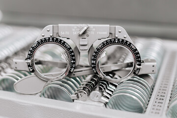 Close-up of glasses for vision testing and lens fitting. An excellent image to illustrate the importance of eye health and diagnostics.