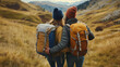 © ANDREI - Loving mid aged couple with a backapacks hiking on the hills together