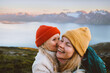 © EVERST - Mother and daughter playing outdoor family hiking together travel lifestyle, child kissing mom in mountains autumn vacations candid emotions, Mothers day holiday