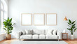 © WiX - Blank picture frame mockup on white wall. Modern living room design. View of modern scandinavian style interior with sofa. Three square templates for artwork, painting, photo or poster