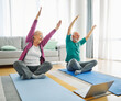© Lumos sp - senior stretching exercise woman training lifestyle sport fitness home healthy man couple together pilates gym exercising fit laptop yoga meditation online class instruction