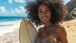 © 99 RIC - African-American woman with afro on beach, holding surfboard, wearing ethnic bikini, smiling.