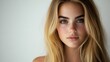 © BlackBird Studio - Close-up Portrait of a Woman with Long Blonde Hair