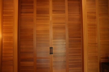 Poster - Stylish wooden sliding doors in hotel room