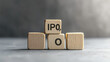 © Cavad - Wooden blocks spell out 'IPO,' which stands for Initial Public Offering.  The gray background and empty space around the blocks suggest business and new beginnings.