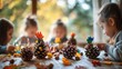 © Viktoriia Boiko - Children crafting pinecone turkeys with colorful feathers, thanksgiving decoration