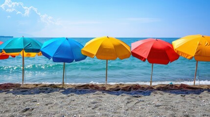 Beach Umbrellas: Colorful beach umbrellas lined up on a European beach