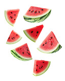 Fresh watermelon slices soaring through the air in a summer display