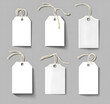 © Mahmud - Set of Blank Price Tags with Strings on a Gray Background