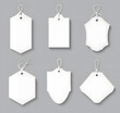 © Mahmud - Set of Blank Price Tags with Strings on a Gray Background