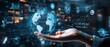 © Littlegirl1398 - Hand with futuristic digital screen displaying data and global map, surrounded by floating icons representing business analytics tools like bar charts or pie graphs. In the background is an abstract