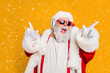 © deagreez - Nightclub invite on christmas party celebration funky crazy santa claus dj in white headset sing song sound melody listen music dance wear stylish x-mas hat suspenders isolated yellow color background