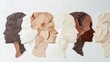 © olga_demina - Textured paper cut-out silhouettes of diverse faces in a row, showcasing equality and inclusion. Multiracial profiles representing unity and diversity.