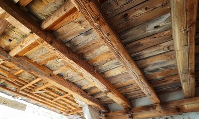 Wall Mural - The wooden beams of the ceiling are brown and have a rustic feel. The wood grain is visible and adds to the overall aesthetic of the space. hyperrealistic Video