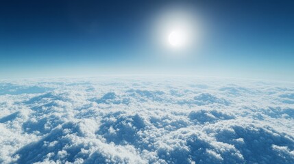 Wall Mural - above the clouds, with a vivid blue sky