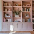 © Lucky_jl - A serene pink bookshelf filled with books, decor, and plants, creating a cozy and stylish interior atmosphere.