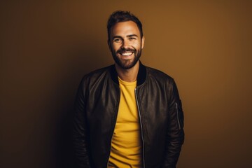 Wall Mural - Portrait of a blissful man in his 30s wearing a trendy bomber jacket in light wood minimalistic setup