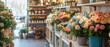 © Pics_With_Love - Colorful flower arrangements in a bright florist shop, showcasing vibrant bouquets of roses, carnations, and assorted flowers in pots for decoration, celebration, and gifting purposes
