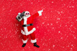 © deagreez - Full body photo of funny cute santa claus with sound boom disco box dancing wearing style eyeglasses eyewear headwear hat isolated over red background