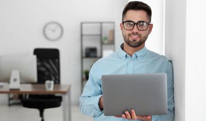 Programmer with laptop in office. Banner design