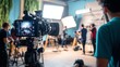 © stardadw007 - A bustling film set with cameras and crew members working together under bright lights, creating a vibrant atmosphere for a production.