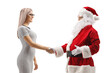 © Ljupco Smokovski - Young woman shaking hands with santa claus