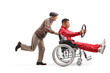 © Ljupco Smokovski - Elderly man pushing a car racer in a wheelchair