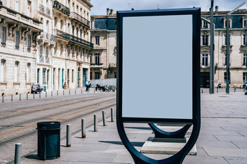 Wall Mural - Line of clear billboards on city street with blank copy space screen for advertising or promotional poster content, empty mockup Lightboxes for information, blank displays outdoors in urban area