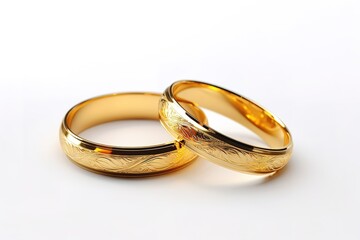 Wedding gold rings isolated on white.