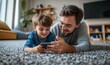 © Image Alchemy - Little boy watching cartoon movie on smartphone with father, lying on floor in kids room. Dad explaining technology to son, digital literacy for kids, Generative AI