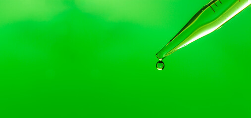 Wall Mural - close-up science experiment green background,macro green science experiment background,lab glassware