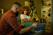 © Zamrznuti tonovi - Young couple having relationship problem during christmas holidays at home