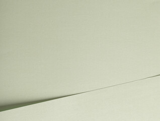 Poster - Paper with a delicate, soft texture in pale mint and frosted ivory green tones. The minimalist, monochrome surface features layered folds and geometric lines, creating a subtle