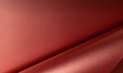 Aufkleber - Red metallic paper with a glossy, reflective texture and smooth folds. Scarlet surface with abstract patterns and elegant, curved details. The subtle sheen and soft light create a