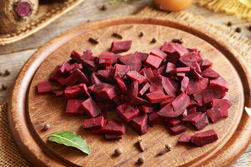 Wall Mural - Sliced red beetroot with spices - preparation of fermented beet kvass