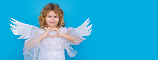 Angel child. Isolated studio shot. Cute kid with angel wings. Wide banner panoramic header copy space. Cupid, valentines day concept.