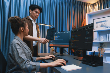 Wall Mural - serious of it developers discussing intelligent website development coder system running data online