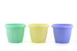 © Родион Бондаренко - multi-colored plastic pots for seedlings and indoor plants and flowers