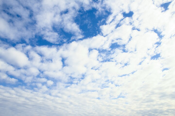 Fantastic soft white clouds against blue sky