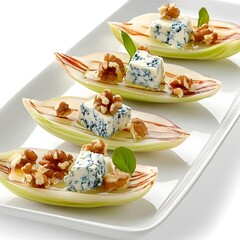 Wall Mural - Elegant platter of belgian endive with blue cheese, walnuts, and honey