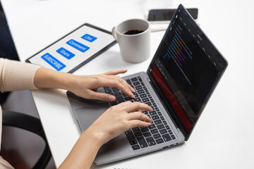 Wall Mural - hand focus of it developer woman coding on laptop screen, creating social media website system of li