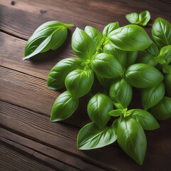 Fresh basil leaves lying on a wooden background