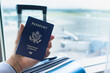 © kieferpix - passport in the hand at airport