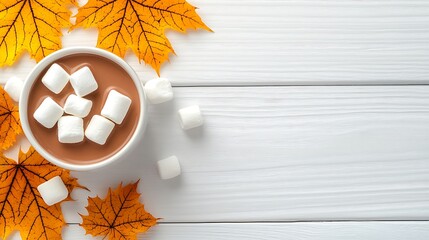 Wall Mural - A comforting cup of hot chocolate with marshmallows rests on a white wooden table, welcoming the chilly season.