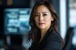© Downloads - Poised and Influential Female Executive Showcasing Her Corporate Leadership and Authoritative Presence in a Sleek and Modern Office Setting