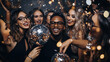 © zadorozhna - Group of smiling multiracial people women and men in evening wear having fun together in night club on new years eve holding disco balls surrounded by flying confetti.