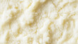 © Ice Cream Paradise - a close-up, top-down view of daikon puree spread across the entire frame, showcasing its pale white color and smooth texture